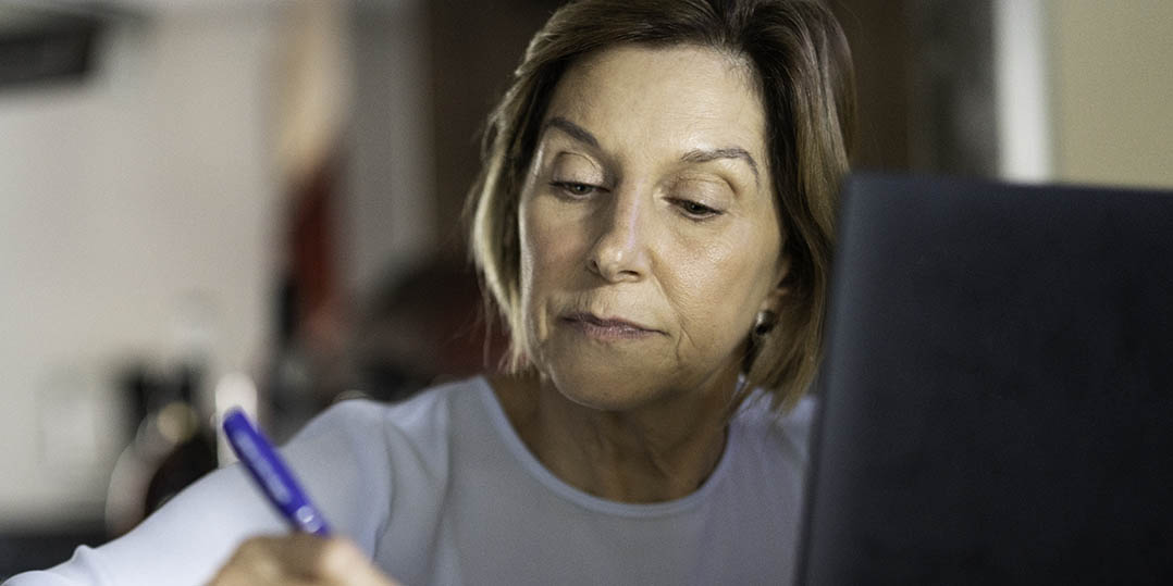 a woman working at a computer